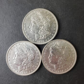 1879 O, 1886, and 1904 O $1 Morgan Silver Dollars