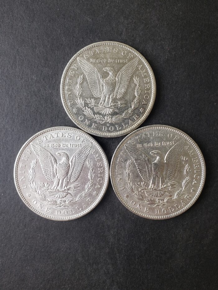 1879 O, 1886, and 1904 O $1 Morgan Silver Dollars - Image 2